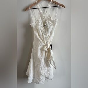 Lulu's White/Ivory Ruffle Detail Wrap Dress